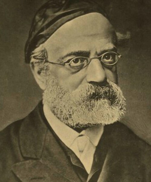 Later-life portrait of Rav Samson Raphael Hirsch wearing glasses and a dark cap